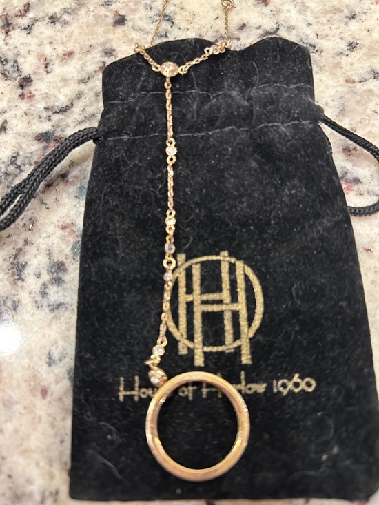 House of Harlow 1960 Gold and Chrystal ring and connected bracelet.